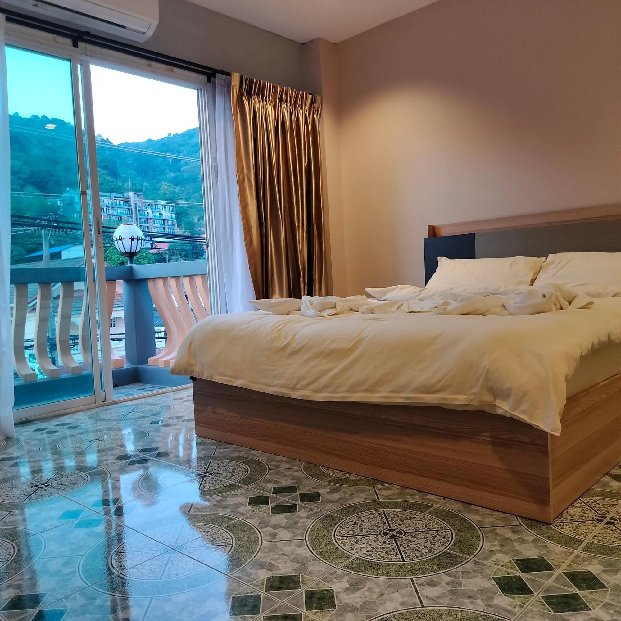 Taxim Residence Boutique Hotel Patong Exterior photo